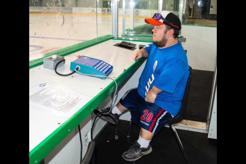Josh Lahay spends much of his time in between the penalty boxes scorekeeping for lacrosse and hockey games. Tyler Evans/OrilliaMatters
