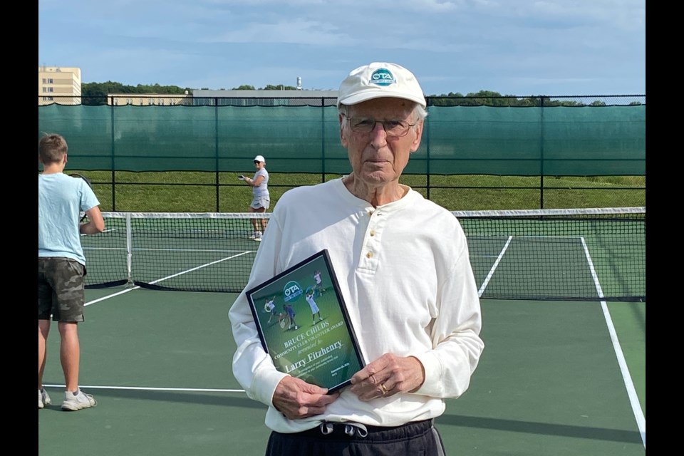 Larry Fitzhenry, past president of the Orillia Tennis Club, recently received the Ontario Tennis Association's Bruce Childs Award.