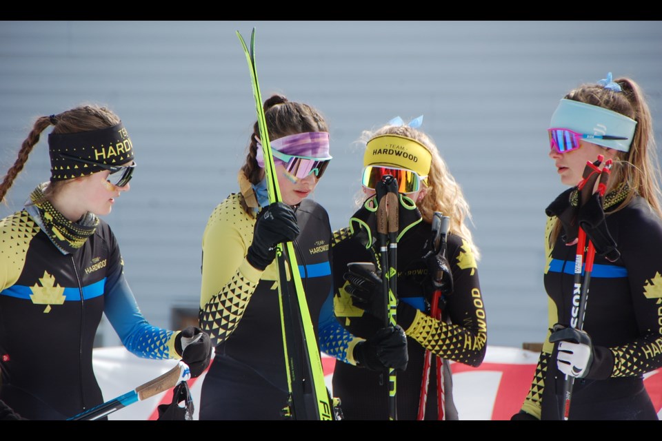 U16 and U18 girls congratulate each other after finishing the Challenge Girls Team Sprint. From left are Bethan Marchant, Holly Ryan, Anna Vurma, and Elle Waite.