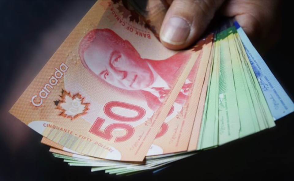 2022-11-22-canadian-money-currency-adobestock