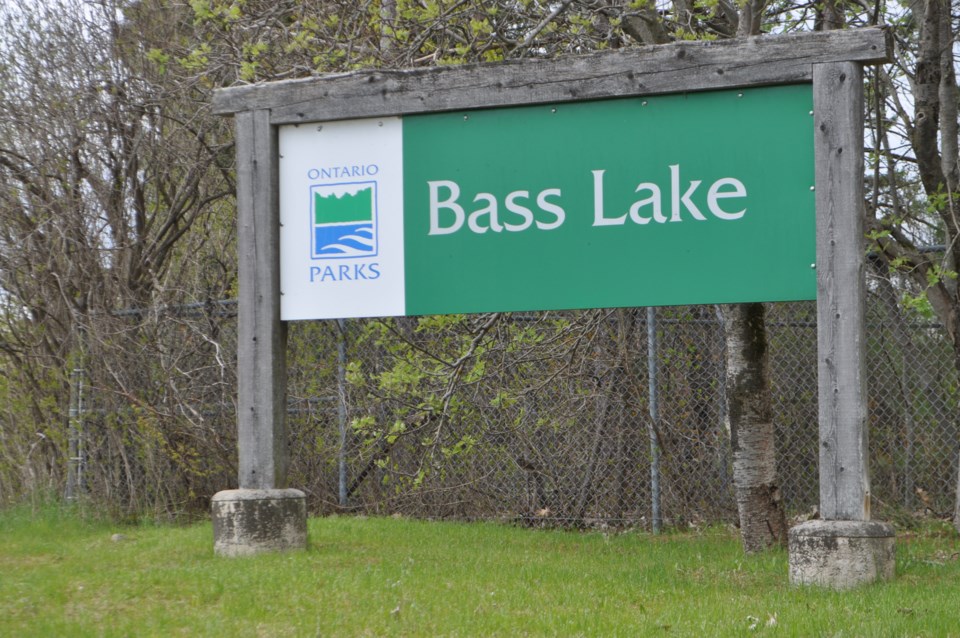 May long weekend at Bass Lake sign