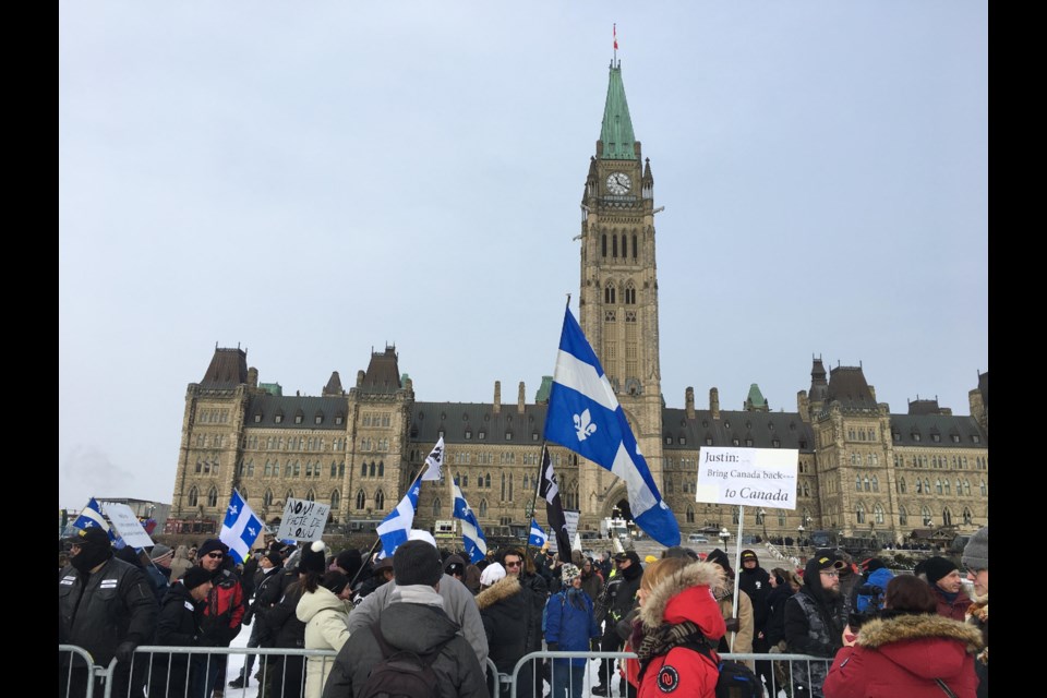 A few hundred people gather at Parliament Hill to rally against the  United Nations Global Compact For Safe, Orderly and Regular Migration. Photo/Cormac McSweeney