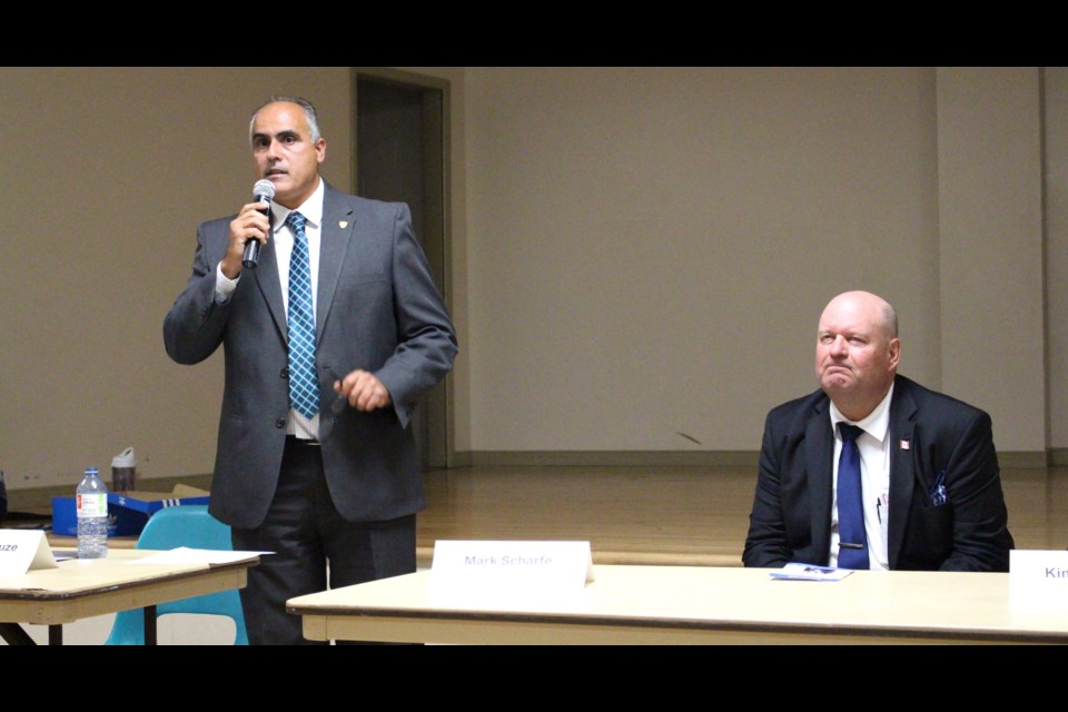 Incumbent George Darouze (left) said the fee is necessary to maintain important infrastructure, and he was able to negotiate the cost to make it more affordable. Drew May/ OttawaMatters.com