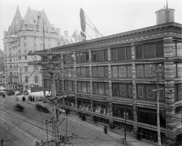 The “Daly Building,” circa 1913, when owned by the Rea Brothers. Photo/ Library and Archives Canada, Topley Studios, I.D. # 3411920.