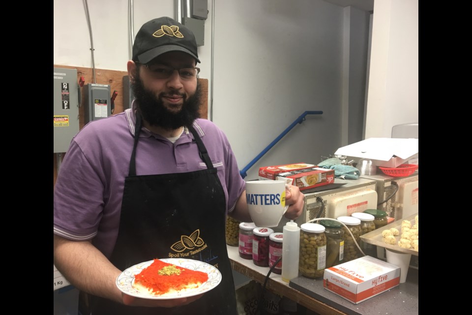 Aziz Sharkh, co-owner of Talluza Desserts in Ottawa. (Andrew Pinsent/OttawaMatters)