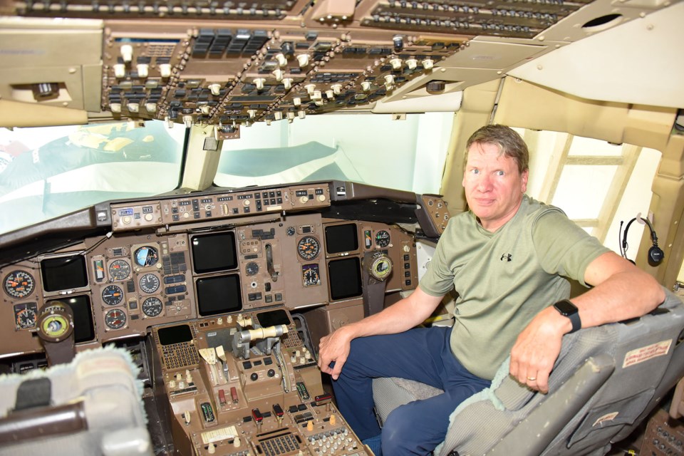 Perry Van Veen inside his 767 cockpit, which weighs 3000 lbs.