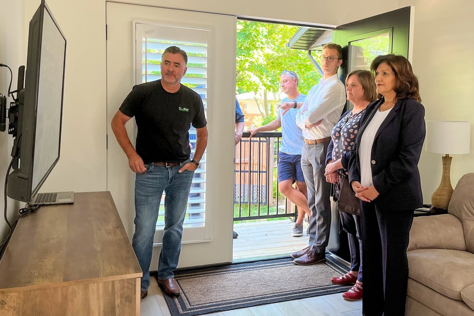 Ray Joncas – President and CEO at Flexobuild explains his hopes for the company to Associate Minister of Housing Hon. Nina Tangri, Town of Pelham Director of Planning Barbara Wiens, and MPP Sam Oosterhoff.