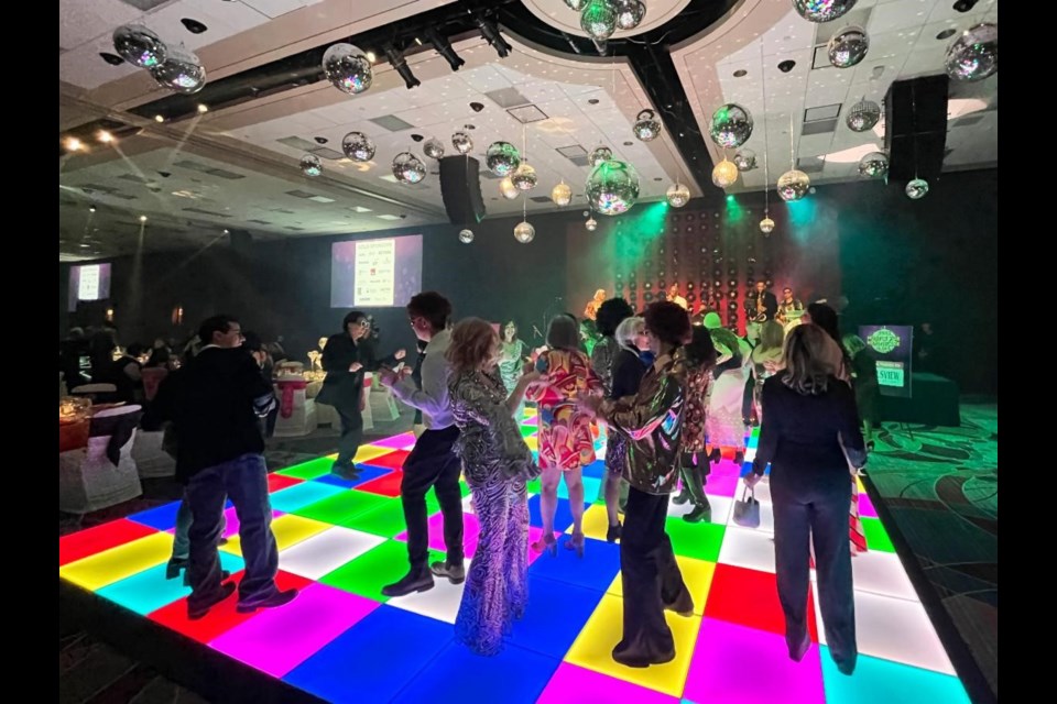 Themed around the vibrant disco era, the gala transformed into a dance 70s night club