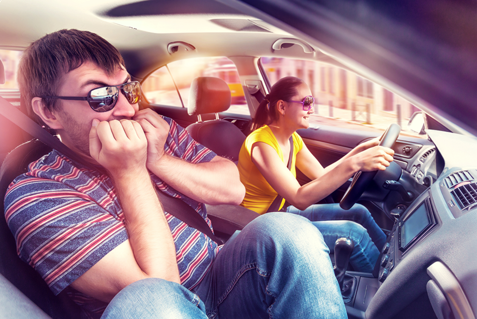 bigstock-Couple-travelling-by-car-SMALL