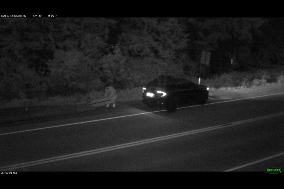 A man captured last month on police surveillance footage near Pemberton who allegedly stole a plastic cutout that the local RCMP uses to deter speeders. 
IMAGE COURTESY OF THE RCMP 
