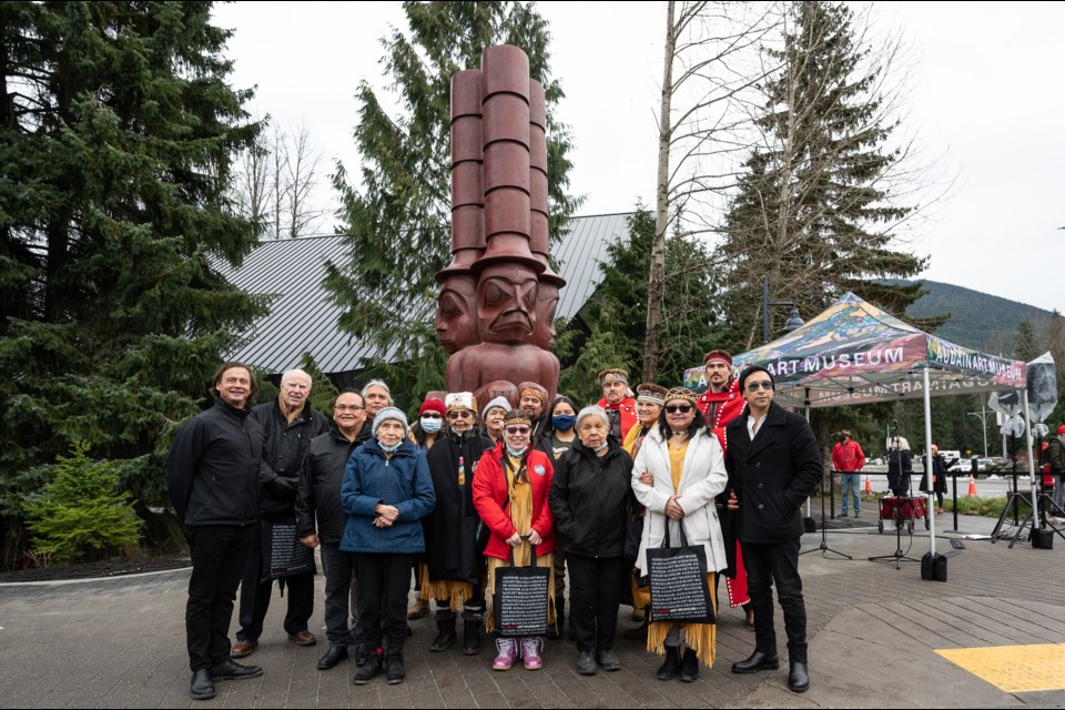 Dr. Curtis Collins, Director & Chief Curator, AAM and Michael Audain, Founder, AAM alongside members of the Squamish Nation, Lil'wat Nation and Haida Nation as well as artists James Hart, Xwalacktun and Levi Nelson