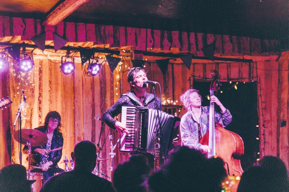 Jack Garton performs on stage with his band. 