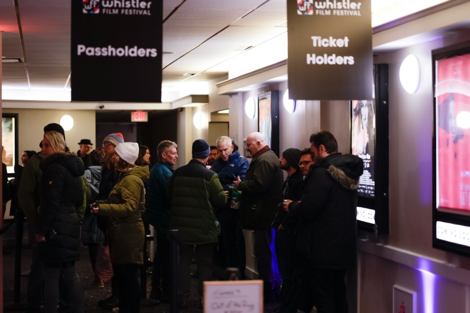Audiences mingle in the hallway of the Village 8 theatre during the 2022 Whistler Film Festival.