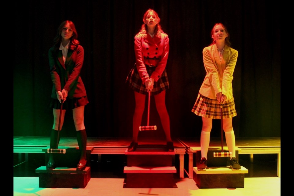 Whistler Secondary School cast members for "Heathers", left to right: Kiara Felice as Heather Duke,  India Murgatroyd as Heather Chandler and Adela Fless as Heather MacNamara. 