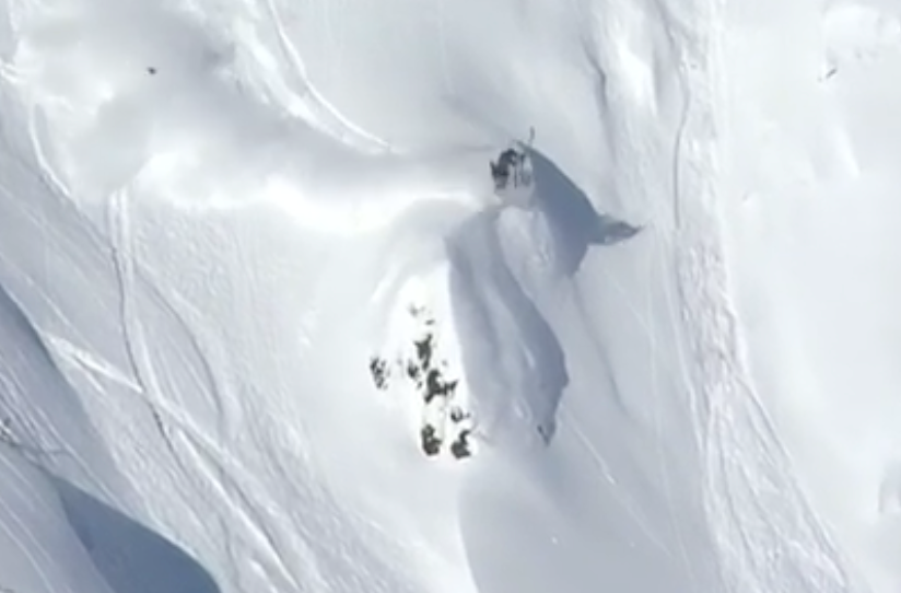 Marcus Goguen mid-backflip on the Freeride World Tour.