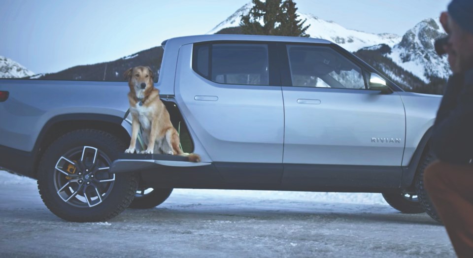 o-outsider 28.17 photo submitted by Rivian-r1t-gear-tunnel-dog-snow