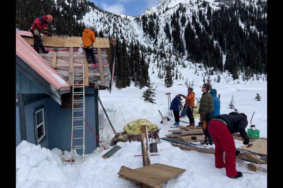 Members of UBC’s Varsity Outdoor Club temporarily repaired the roof of the Brian Waddington Memorial Hut, near Pemberton, after it detached in March. The club is fundraising for a more permanent fix this summer.