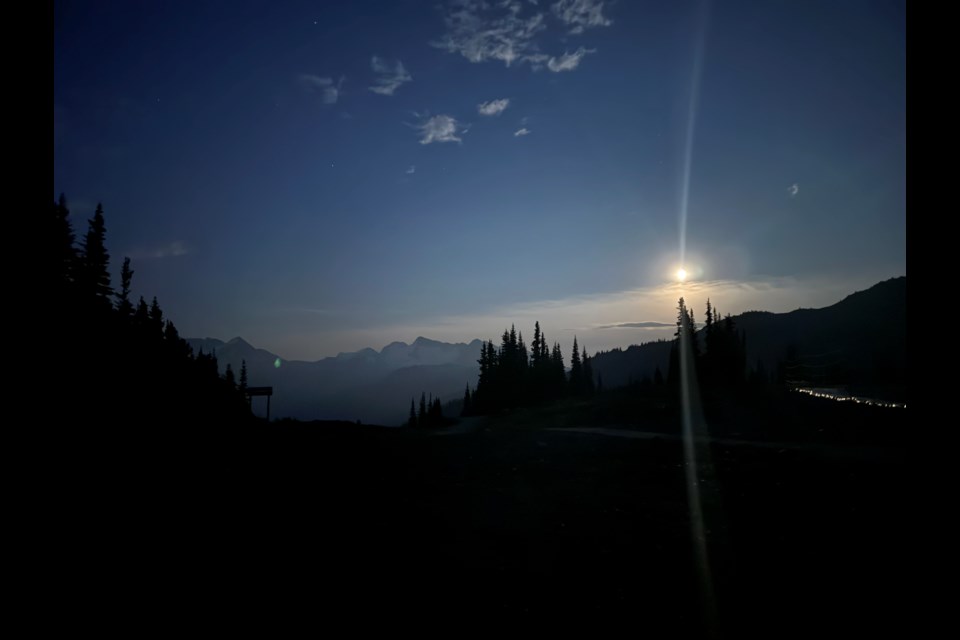 A near full-moon lights the night during Helly Hansen's Summit Sleepover
