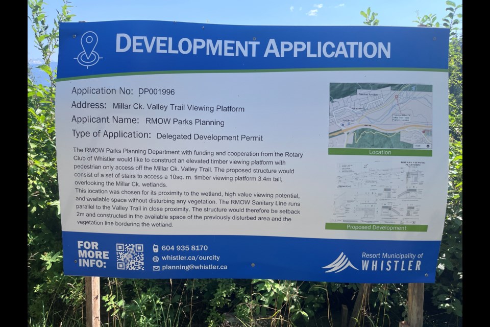 The RMOW signage alerting residents to the coming viewing platform to be installed near Function Junction.