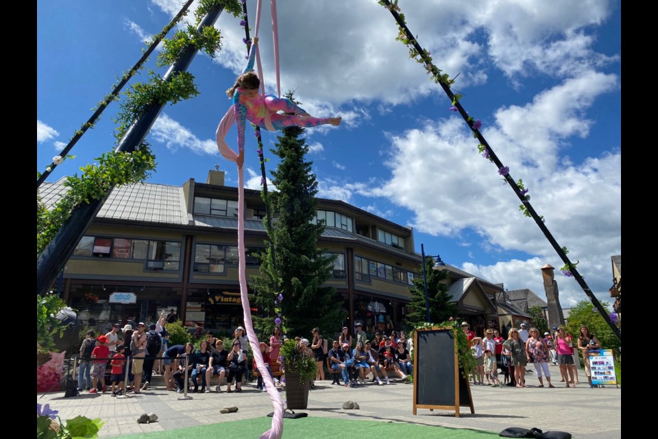 A Treeline Aerial performer wows the crowd assembled at Skiers Approach in Whistler Village.