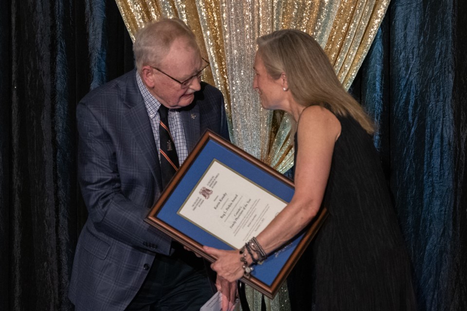 Whistler Medical Clinic doctor Karin Kausky accepts the Reg L. Perkin Family Physician of the Year Award from Perkin himself during an awards gala in Toronto on Nov 11. 