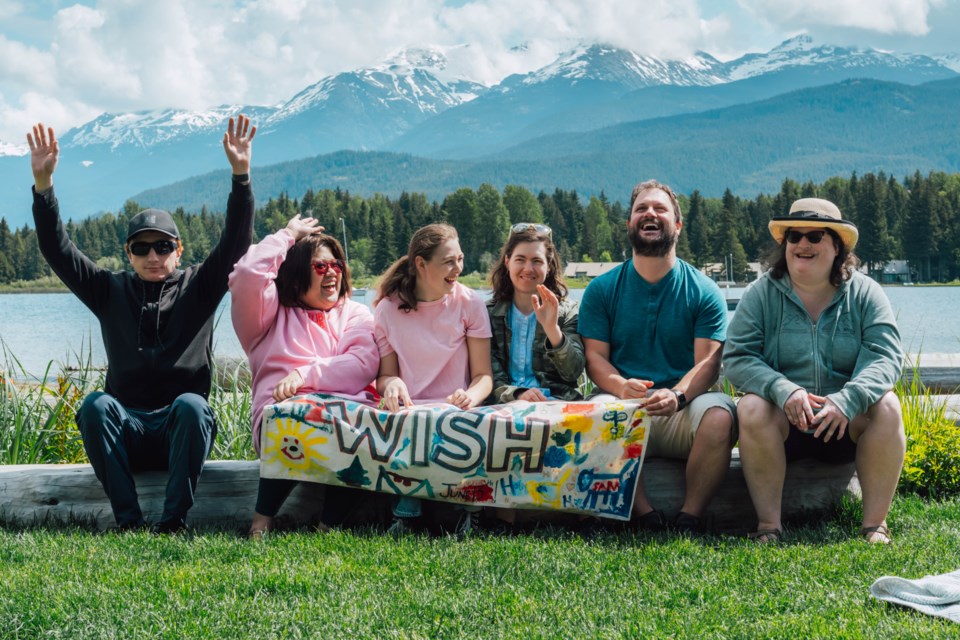 Future residents of a Whistler Sports Legacies housing project gather for a photoshoot in June 2025. These adults with developmental disabilities will soon have access to supportive housing.