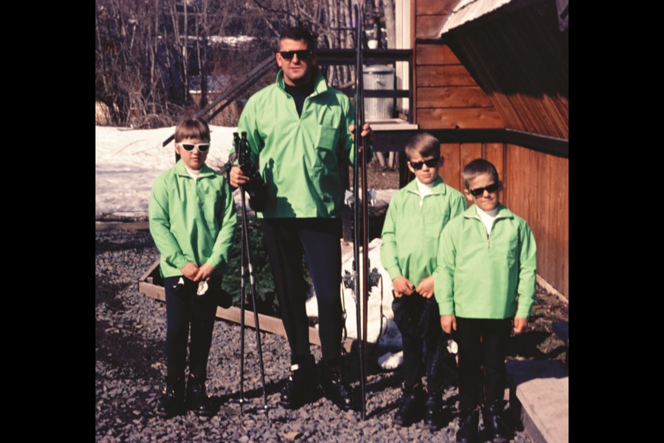 L to R: Judy, Casey, Steve and Greg Niewerth—a.k.a. Jolly Green Giant and The Three Little Sprouts—pictured in 1968 by their family cabin in Alta Vista. 