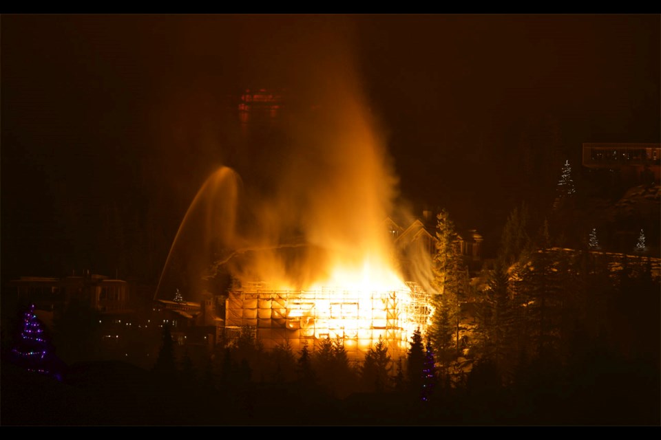 An under-construction building on Sunridge Drive in Whistler’s Brio neighbourhood went up in flames on Friday, Jan. 15. The fire is under investigation. Photo by Steve Burgess.