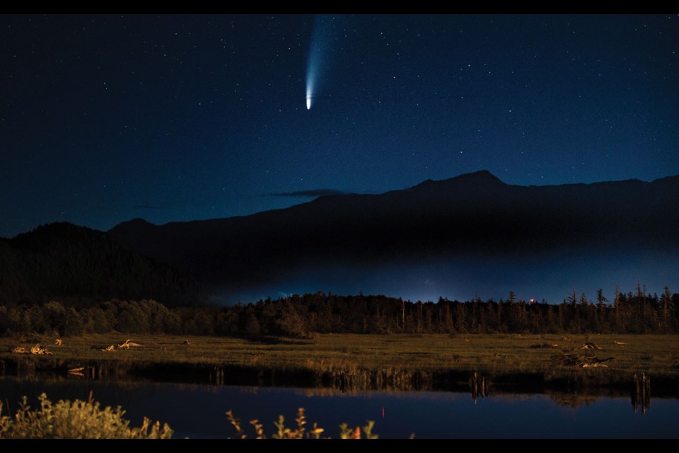 COMET CAUGHT The Neowise comet, discovered in March by NASA’s Neowise infrared space telescope, is pictured over the Sea to Sky Corridor in this stunning shot. The comet will be visible to the naked eye over southern B.C. for the next few weeks.  
Photo by Brian Aikens 