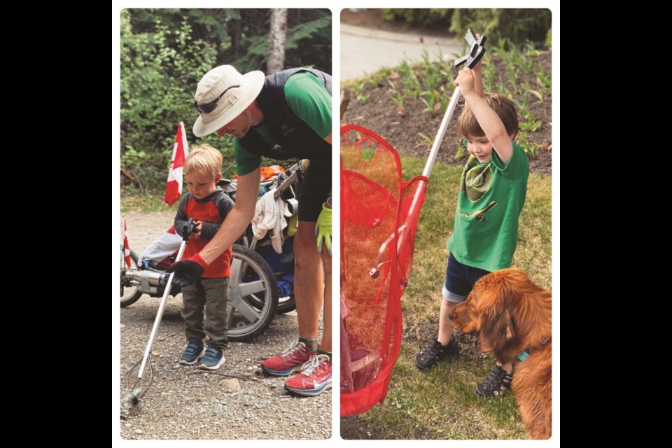 CLEAN-UP Jackson Armitage, 4, and Shane Mac, 3, meet with Andy Sward, whose Million Bottle Pledge sees him run up and down the Sea to Sky corridor picking up litter regularly. The local kids recently met with Andy at Lost Lake Park
to do a clean up of their own. For more information, visit millionbottle.com