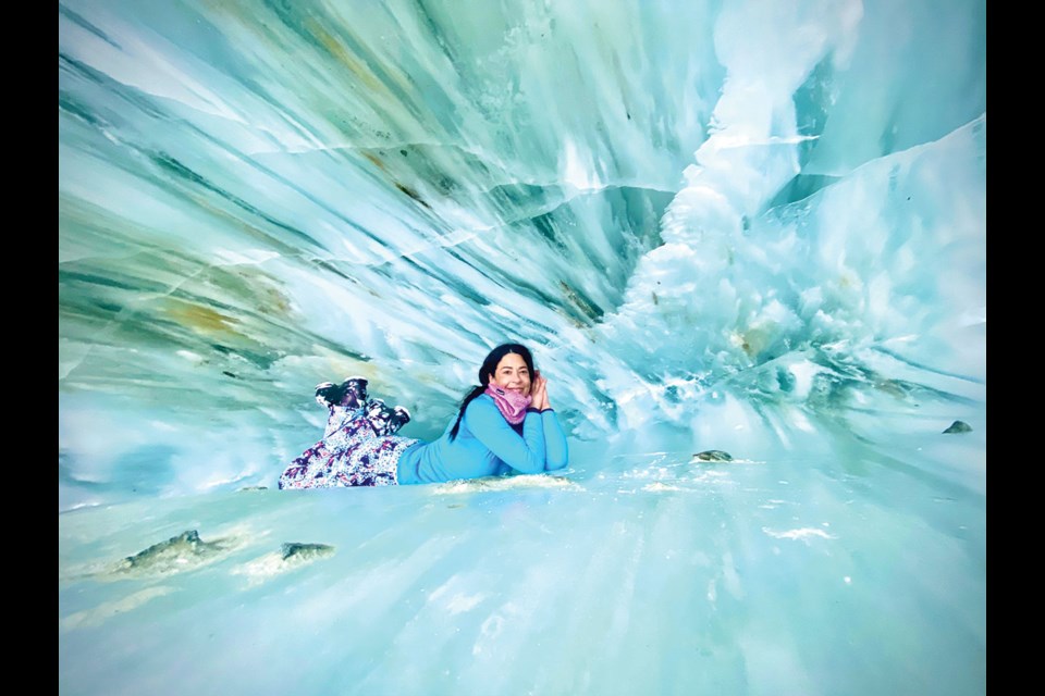 ICE CAVE, CAMERA, ACTION Taking photos is pretty much mandatory when visiting the exceptionally photogenic ice cave on Blackcomb Glacier.