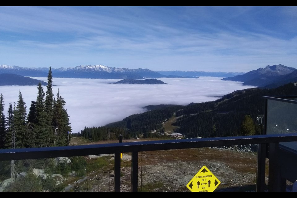 ABOVE THE CLOUDS Another beautiful day in Whistler—so long as you were above the cloud cover, as seen from Christine’s.
Photo by Ty Watts