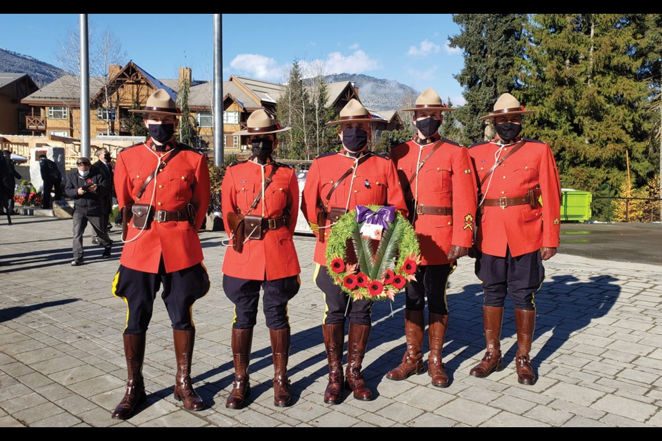 Staff/Sgt. Paul Hayes placing the wreath on behalf of the RCMP at the Cenotaph and the RCMP contingent who were in Red Serge that day. 
Photo Submitted.