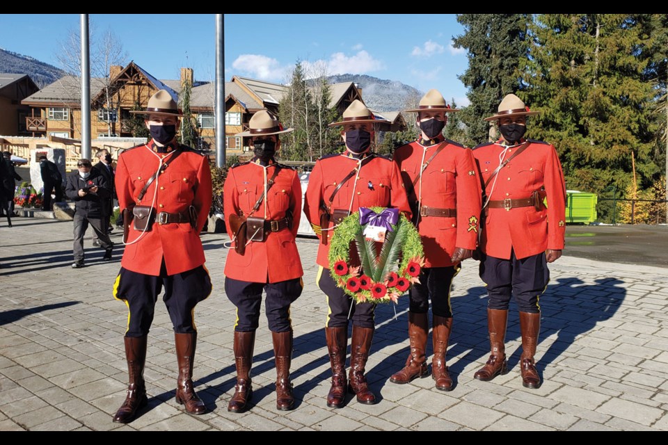 Staff/Sgt. Paul Hayes placing the wreath on behalf of the RCMP at the Cenotaph and the RCMP contingent who were in Red Serge that day. 
Photo Submitted.