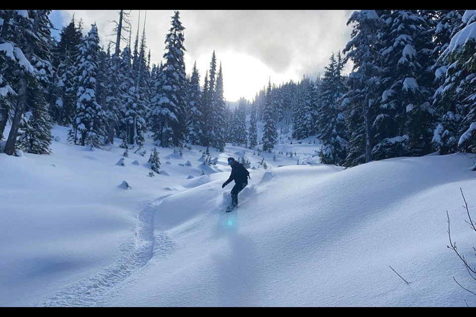 OPENING DAY The extra-long wait was worth it. Whistler Blackcomb opened for the winter season on Thursday, Nov. 26 with decent conditions, as Angie Jones experiences here.
Photo by Stu Benner.