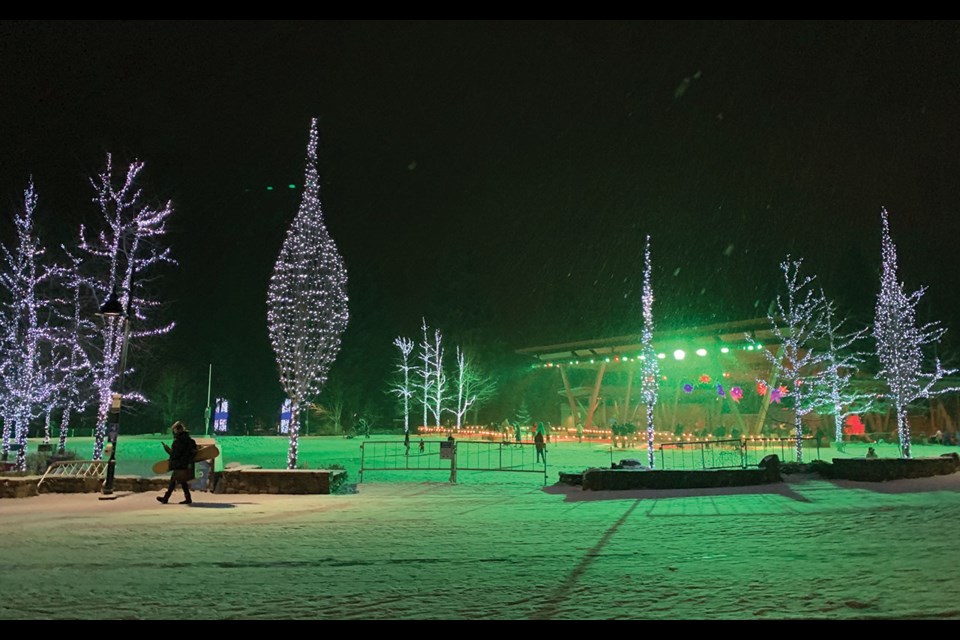 IT’S LIT Whistler’s Olympic Plaza is aglow with Christmas lights this holiday season, while the ice rink is open to skaters. 
Photo by Megan Lalonde 