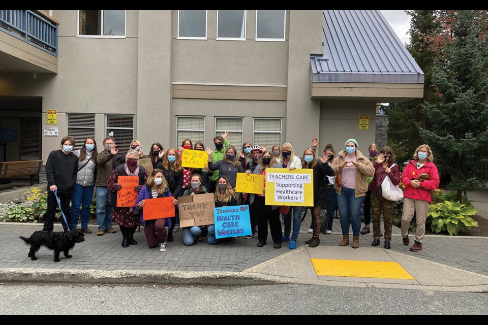 HEALTHCARE HEROES Members of the Sea to Sky Teachers Association (SSTA) rallied outside of the Whistler Health Care Centre on Monday, Sept. 20 to show their support and gratitude for healthcare workers’ efforts during the past 18 months, especially given the negativity of recent protests. The show of support was well received, said the SSTA—as were the individual bags of candy teachers brought for each Health Care Centre staff member. 