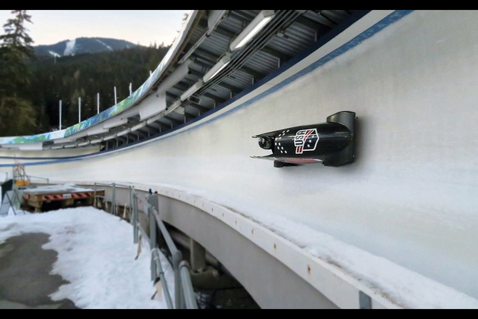 TRAINING DAY An American bobsleigh pilot heads down the Whistler Sliding Centre track during a Wednesday, Nov. 16 training session for this weekend’s BMW IBSF World Cup bobsleigh and skeleton races. 