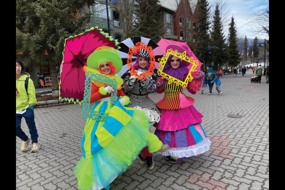 FAMILY FUN Paintertainment performers ditched the festive fits for more evergreen fashions to keep visitors and locals entertained in Whistler Village on Family Day Monday, Feb. 20. 