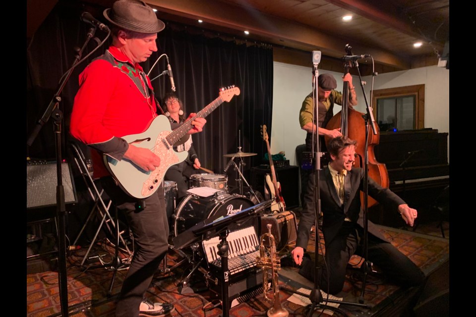 FEAST, NOT FAMINE Jack Garton kept the packed house hoppin’ at The All Original Orphans’ Winter Feast at The Point Artist-Run Centre on Saturday night, Dec. 9. 