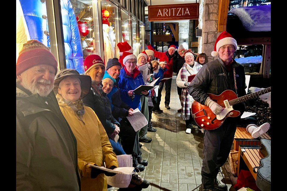 GRAND TRADITION This year marked the 14th year in a row this group of jolly locals hit Whistler’s Village Stroll to provide some Christmas spirit to guests and fellow locals alike—”think it was especially needed this last Friday night with all that rain!” says Iain Grunwell. 