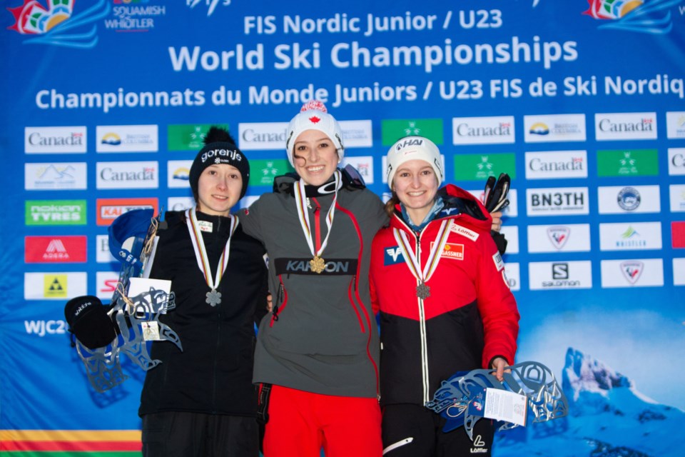 Alexandria Loutitt (centre) celebrates gold at the Nordic Ski World Juniors in Whistler with fellow podium finishers Nika Prevc (left) and Julia Muehlbacher. 