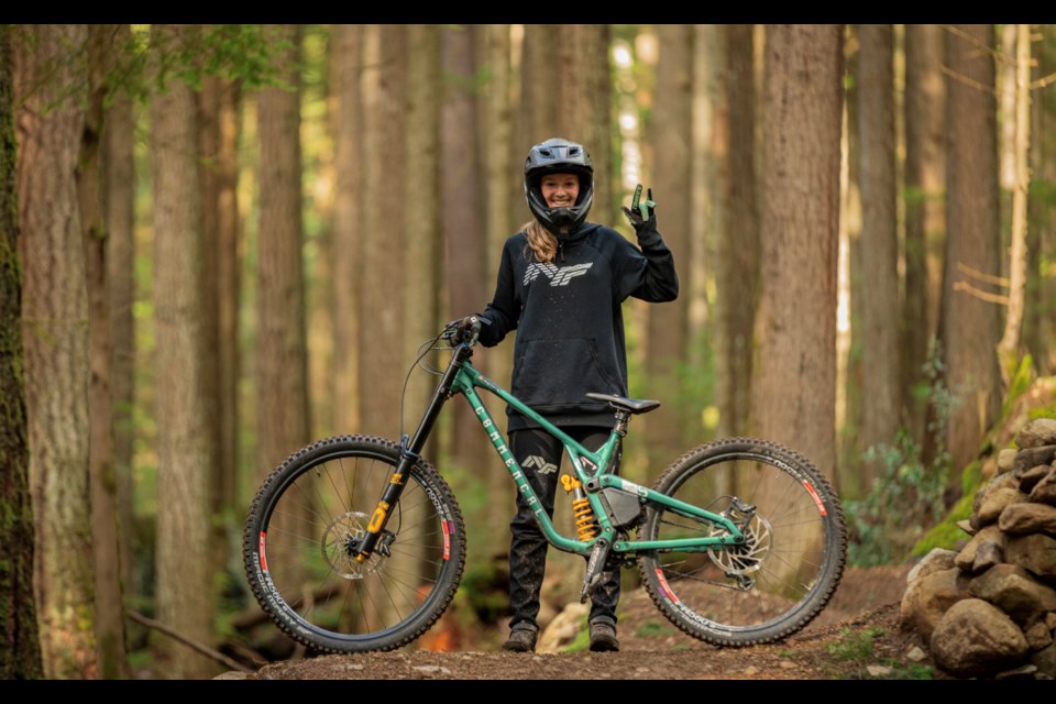 Caileigh Koppang smiles for the camera. The 14-year-old opened her downhill racing career with five podium finishes in as many events.