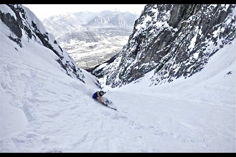Squamish sit-skier Alex Cairns dropping into the Diagonal Couloir on Mount Currie in March.  
