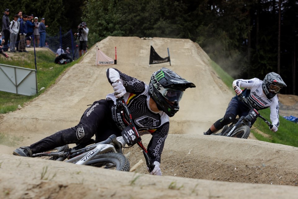Dante Silva (foreground) battles Austin Warren at the 2025 Crankworx Whistler Dual Slalom. 