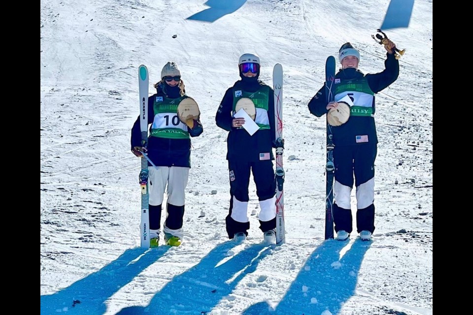 Maya Mikkelsen (left) stands with her fellow podium finishers at the Nor-Am Cup dual moguls event in Deer Valley, Utah on Feb. 8-9, 2023. 