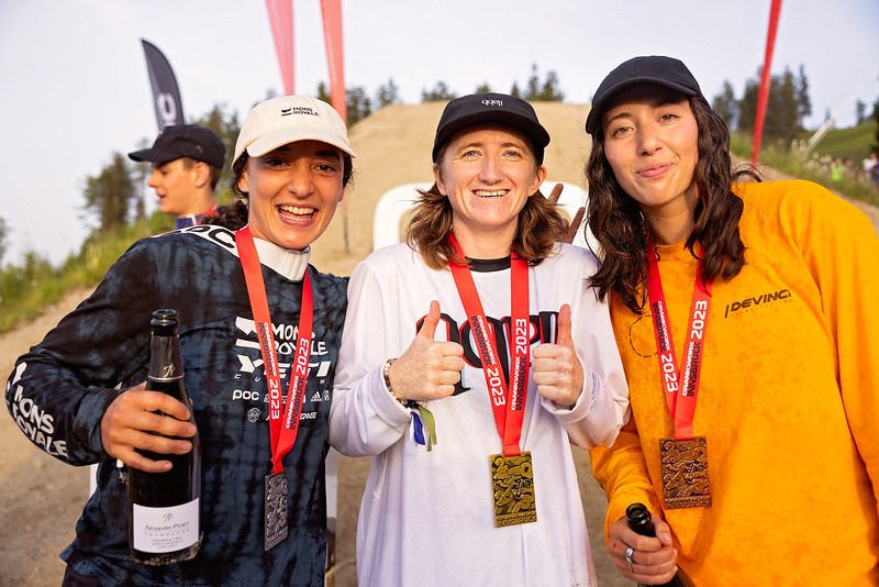 Georgia Astle (right) alongside Vinny Armstrong (middle) and Robin Goomes: the women's podium at Crankworx Innsbruck's 2023 Whip-off Championships. 
