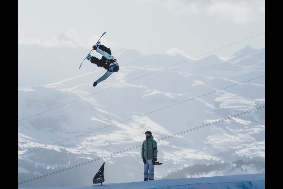 Jasmine Baird goes airborne while another person looks on. 