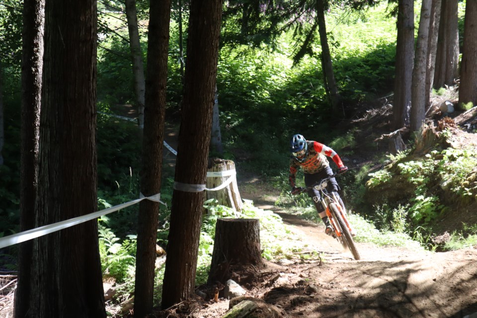 Whistler's Jesse Melamed bombs through the trees in Stage 2 of EWS Whistler.