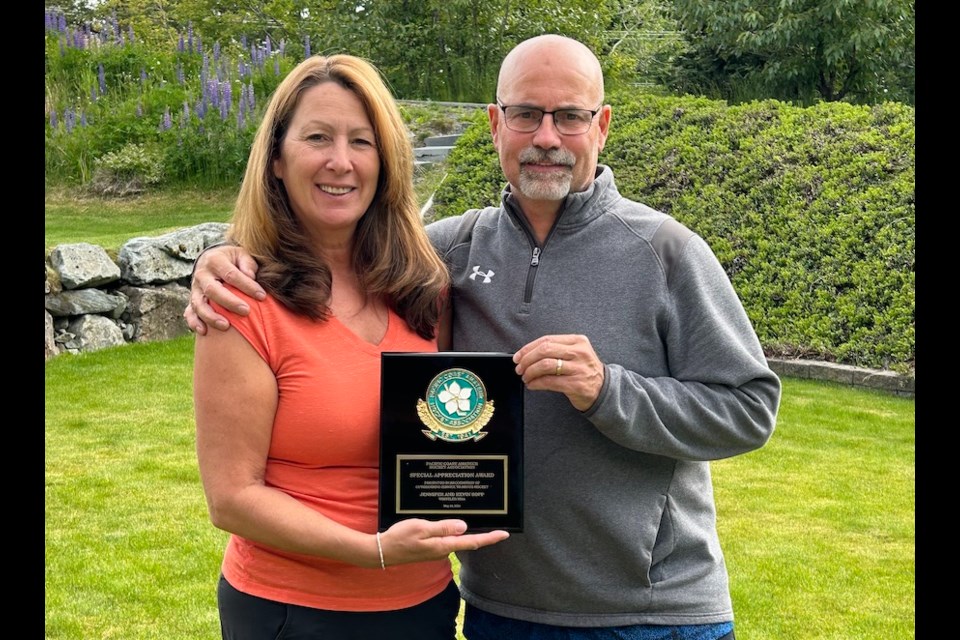 Kevin Sopp (right) and his wife Jennifer received a PCAHA Special Appreciation Award for nearly 30 years of coaching and managing Sea to Sky hockey teams.